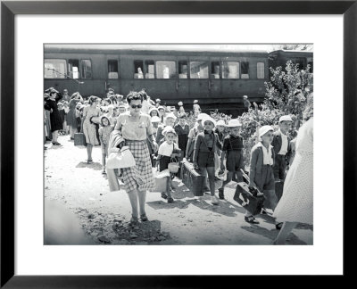 Large Group Of Children From A Summer Camp Arrive At A Train Station by A. Villani Pricing Limited Edition Print image