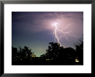 Bolt Of Lightning Brightens A Night Sky by Rex Stucky Pricing Limited Edition Print image