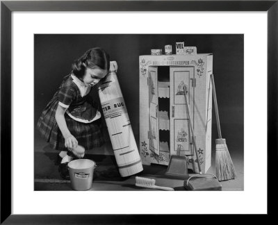Little Girl With A Toy House Cleaning Kit by Walter Sanders Pricing Limited Edition Print image