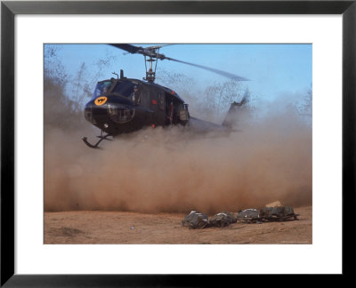 Helicopter Touching Down To Retrieve Bodies Of Soldiers Killed In Firefight During The Vietnam War by Larry Burrows Pricing Limited Edition Print image