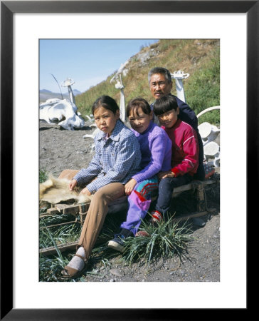 Eskimos, Sledge And Whale Bones At Yanrakino Village, Chukchi Peninsula, Russian Far East, Russia by Geoff Renner Pricing Limited Edition Print image