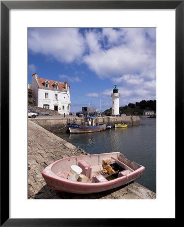 Lighthouse On Waterfront, Port Sauzon, Belle Ile En Mer, Brittany, France by Guy Thouvenin Pricing Limited Edition Print image