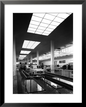 Inside Of A Fiat Factory In Bologna, The Cars Are Being Assembled By The Workers by A. Villani Pricing Limited Edition Print image