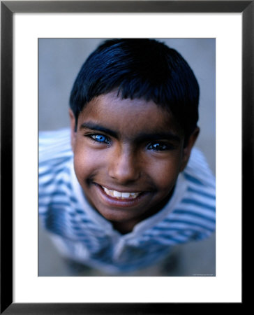 Boy With One Blue And One Brown Eye, Nawalgarh, Rajasthan, India by Daniel Boag Pricing Limited Edition Print image