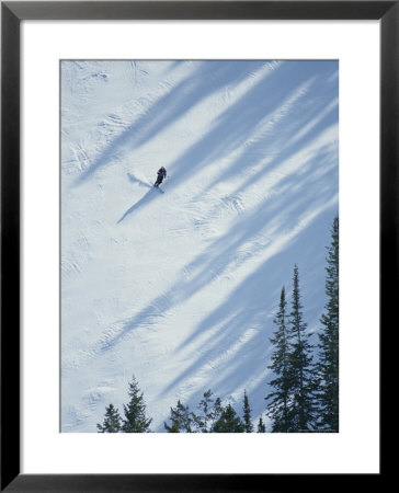 Skier Glides Across A Pine-Shadowed Slope At Deer Valley Resort, Utah by James P. Blair Pricing Limited Edition Print image