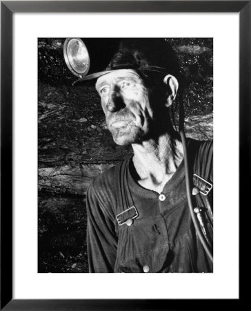 Coal Miner With Head Gear On Working In Mine by Dmitri Kessel Pricing Limited Edition Print image