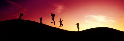 Silhouette Of Children Running And Jumping by Tom Gerczynski Pricing Limited Edition Print image