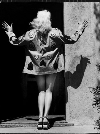 Actress Betty Grable Modeling Shirt Of Her Own Design Decorated With Army Insignias by Walter Sanders Pricing Limited Edition Print image