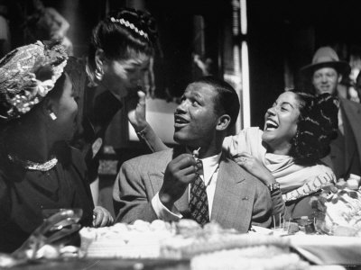 Sugar Ray Robinson Watching His Wife Feed His Sister An D'oeuvre At His Birthday Party by Ralph Morse Pricing Limited Edition Print image
