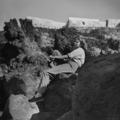 Ingrid Bergman, Perching A Rock To Survey Her Island In The Movie Stromboli by Gordon Parks Pricing Limited Edition Print image