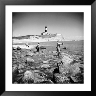 Surf Casting Fishermen Working The Shore Near The Historic Montauk Point Lighthouse by Alfred Eisenstaedt Pricing Limited Edition Print image