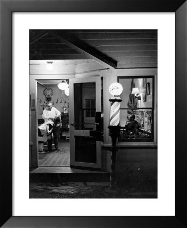 Small Town Barber Grover Cleveland Kohl Working In His Shop At Night by Alfred Eisenstaedt Pricing Limited Edition Print image
