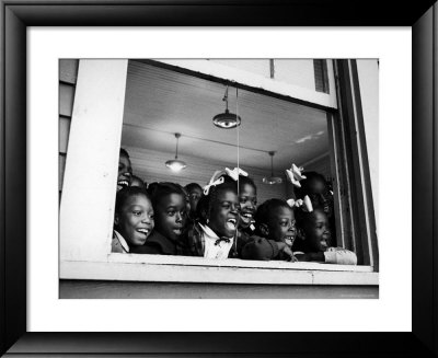 Students Looking Out The Window Of The All Black Thomy Lafon School by Robert W. Kelley Pricing Limited Edition Print image
