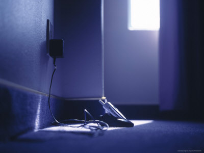 Cell Phone Charging On The Floor by Fogstock Llc Pricing Limited Edition Print image
