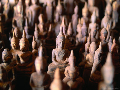 Small Buddha Images In Tham Ting Caves, Pak Ou, Luang Prabang, Laos by Bernard Napthine Pricing Limited Edition Print image