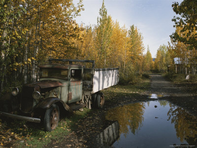 Vintage Ford Truck Parked On A Lane In Mccarthy by George Herben Pricing Limited Edition Print image