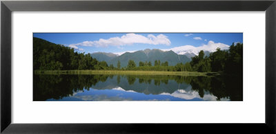 Reflection Of Mountains In Water, Lake Matheson, Westland National Park, South Island, New Zealand by Panoramic Images Pricing Limited Edition Print image