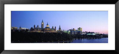 Silhouette Of Parliament Building Along A Lake, Ottawa, Ontario, Canada by Panoramic Images Pricing Limited Edition Print image