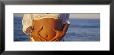 Pregnant Woman Touching Her Abdomen, Oak Street Beach, Chicago, Illinois, Usa by Panoramic Images Pricing Limited Edition Print image