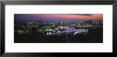 City At A Port Lit Up At Dusk, Genoa, Liguria, Italy by Panoramic Images Pricing Limited Edition Print image