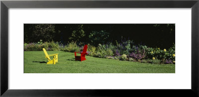 Red And Yellow Adirondack Chairs On A Lawn, Vergennes, Vermont, Usa by Panoramic Images Pricing Limited Edition Print image
