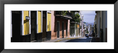 Car Moving On A Street, Calle Del Cristo, Old San Juan, Puerto Rico by Panoramic Images Pricing Limited Edition Print image