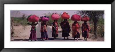 Women Standing On A Road With Luggage On Their Head, Siana, Jodhpur, Rajasthan, India by Panoramic Images Pricing Limited Edition Print image