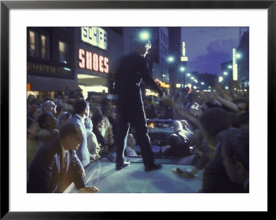 Presidential Candidate Robert Kennedy Standing On Back Of Convertible Car While Campaigning by Bill Eppridge Pricing Limited Edition Print image