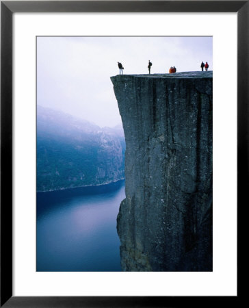 People On Preikestolen (Pulpit Rock) With Lysefjord 604M Below, Lysefjord, Norway by Graeme Cornwallis Pricing Limited Edition Print image