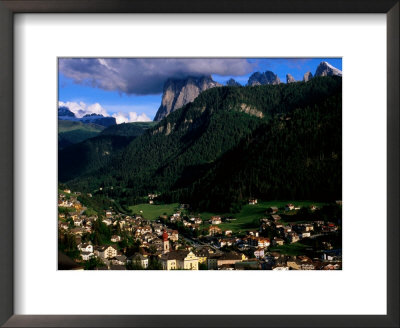 Ortisei Village And Peak Of Sassolungo In Dolomites, Ortisei, Trentino-Alto-Adige, Italy by Glenn Van Der Knijff Pricing Limited Edition Print image