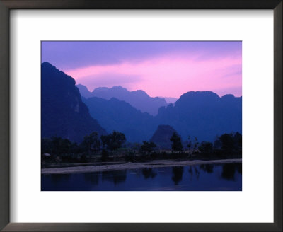 Sunset Over Huge Limestone Rock Formations, Vang Vieng, Vientiane, Laos by Bill Wassman Pricing Limited Edition Print image