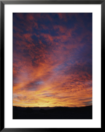 Sunrise Highlights The Clouds Over Death Valley National Monument by Marc Moritsch Pricing Limited Edition Print image