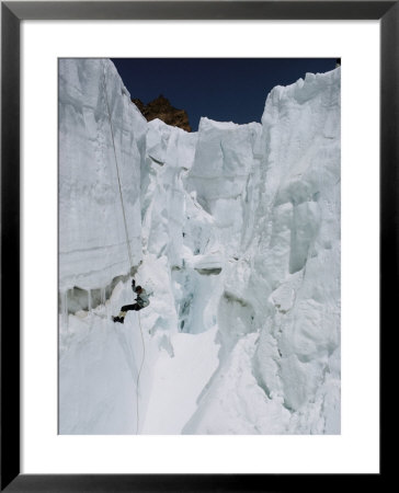 A Man Participating In Crevasse-Rescue Practice by Barry Bishop Pricing Limited Edition Print image