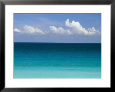 Clear Blue Water And White Puffy Clouds Along The Beach At Cancun by Michael Melford Pricing Limited Edition Print image