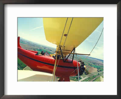 Passenger And Pilot In Biplane Over Tulip Fields, Skagit Valley, Washington, Usa by Stuart Westmoreland Pricing Limited Edition Print image