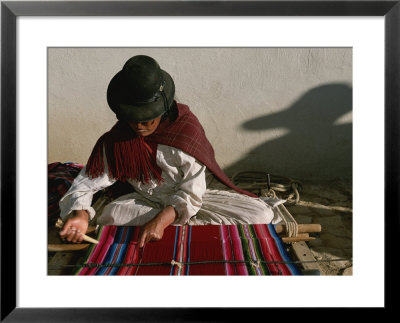 A Bolivian Woman Weaves Brightly Colored Fabric On A Loom by Kenneth Garrett Pricing Limited Edition Print image