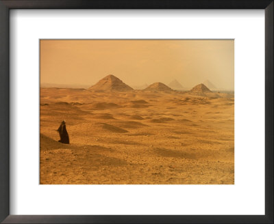 A Solitary Figure In The Desert At Abusir by Kenneth Garrett Pricing Limited Edition Print image