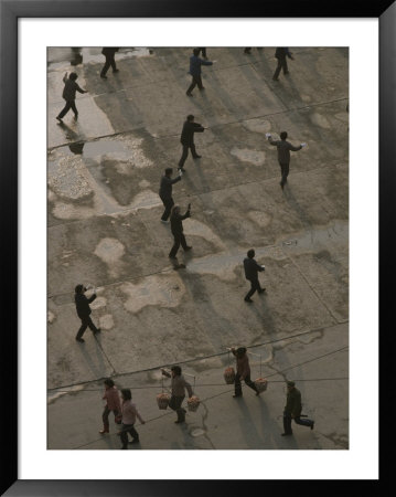 An Exercise Group Does Tai-Chi While Pedestrians Pass By by Jodi Cobb Pricing Limited Edition Print image