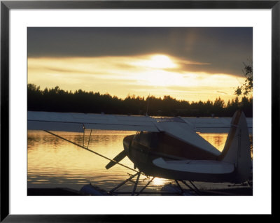 Backlit Floatplane, Ak by Jim Oltersdorf Pricing Limited Edition Print image