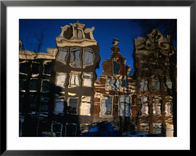 Buildings Reflected In Puddle, Amsterdam, Netherlands by Martin Moos Pricing Limited Edition Print image