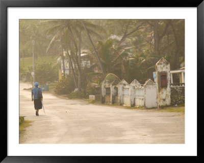 Woman Walking In Sea Mist, Bathsheba, Barbados by Walter Bibikow Pricing Limited Edition Print image