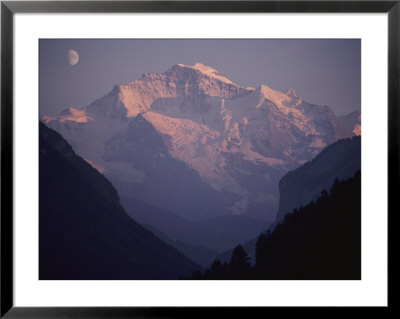 A View Of The Jungfrau Mountains And The Moon From Interlaken, Switzerland by Jodi Cobb Pricing Limited Edition Print image