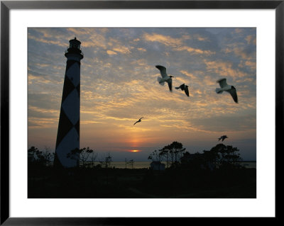 Cape Lookout Lighthouse Silhouetted Against The Sky by Stephen Alvarez Pricing Limited Edition Print image