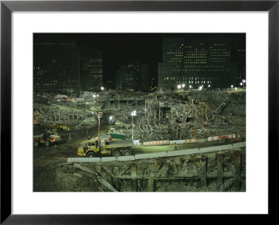 An Elevated View Of Ground Zeros Devastation At Night; Crews, Their Vehicles, And Other Equipment by Ira Block Pricing Limited Edition Print image