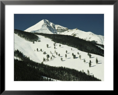 Elevated View Of Slope At Big Sky Ski Resort by Raymond Gehman Pricing Limited Edition Print image