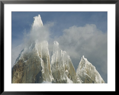 The Summit Of Cerro Torre Massif Rises Through The Clouds by Jimmy Chin Pricing Limited Edition Print image