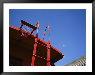 A Ladder Leads To The Top Of A Train Caboose by Raul Touzon Pricing Limited Edition Print image