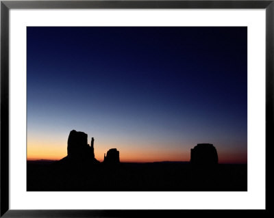 Sunrise Over The Mitten Buttes In Monument Valley by Michael Nichols Pricing Limited Edition Print image