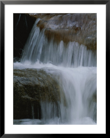 Water Tumbles Over Rocks In Yosemite National Park by Marc Moritsch Pricing Limited Edition Print image
