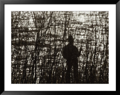 A Silhouetted Fisherman On The Banks Of The Salmon River by Joel Sartore Pricing Limited Edition Print image